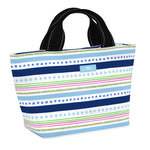Scout All the TrimmingsNooner insulated lunch bag with wide base for easy loading – available at Be Charmed