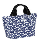 Blue floral-patterned lunch bag with black handles on a white background. Available at Be Charmed