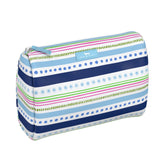 Scout All the Trimmings Packin’ Heat toiletry bag with roomy interior and slim profile – available at Be Charmed