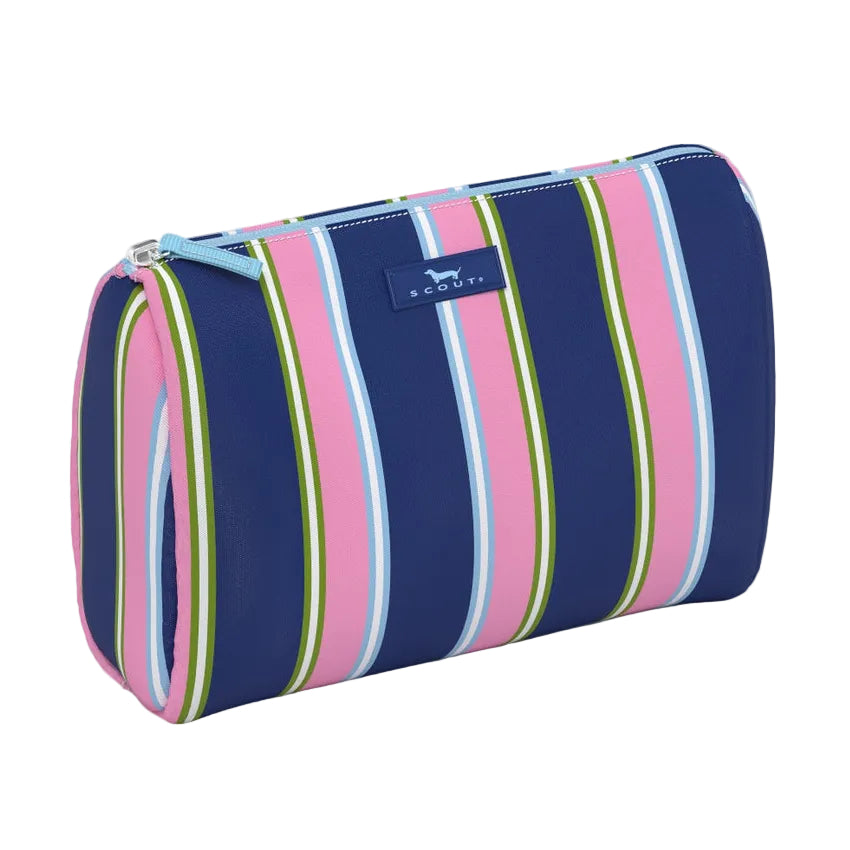 A cylindrical zippered Scout cosmetic pouch with vertical stripes in navy blue, pink, light blue, lime green, and white, featuring a small blue brand patch on the front. Available at Be Charmed