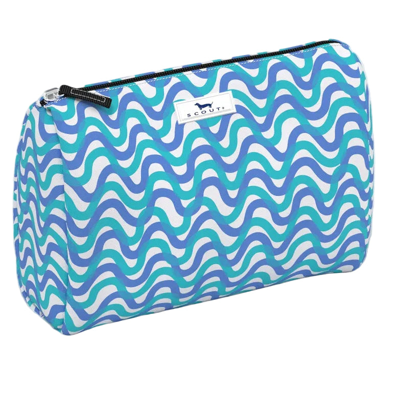 Blue and white wavy patterned toiletry bag on a white background. Available at Be Charmed