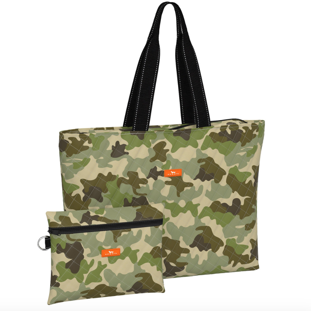 A camo tote bag with black straps and a smaller zippered pouch, both with the 'scout' brand visible. Available at Be Charmed