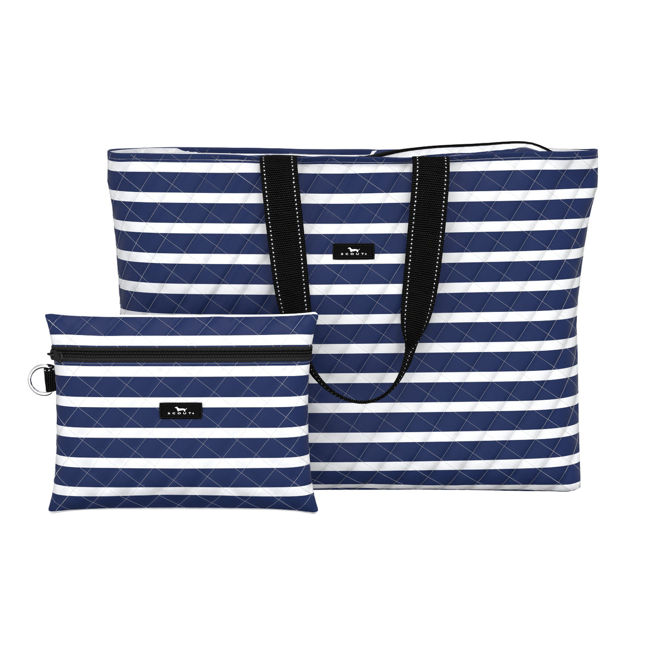 A navy & white striped tote bag with black straps and a smaller zippered pouch, both with the 'scout' brand visible. Available at Be Charmed