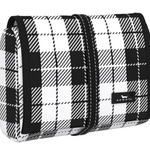 A rolled-up cosmetic or toiletry bag with a black and white checkered pattern, featuring a strap closure. Available at Be Charmed