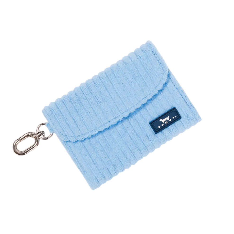 A light blue ribbed fabric Scout card holder pouch with a silver metal clasp and a small dark blue brand tag, shown on a clean white background. Available at Be Charmed