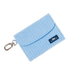 A light blue ribbed fabric Scout card holder pouch with a silver metal clasp and a small dark blue brand tag, shown on a clean white background. Available at Be Charmed