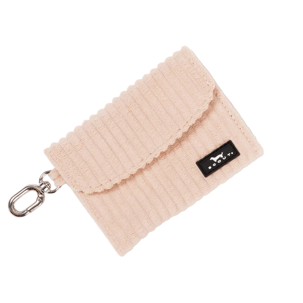 A tan ribbed fabric Scout card holder pouch with a silver metal clasp and a small black brand tag, shown on a clean white background. Available at Be Charmed