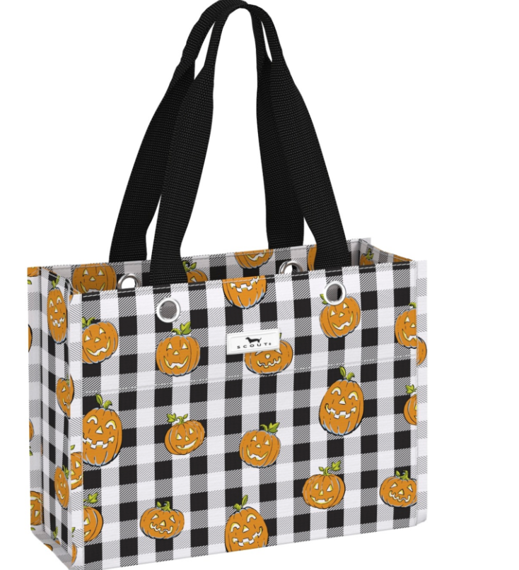A tote bag with a black and white buffalo check pattern and an all-over print of orange jack-o'-lantern pumpkins. It features two black shoulder straps and a small white brand label on the front. Available at Be Charmed