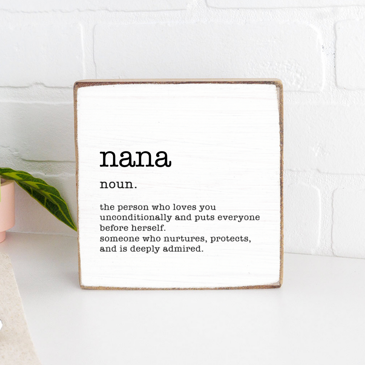 Rustic Marlin Nana Definition 6 X 6 Wood Block pictured on counter