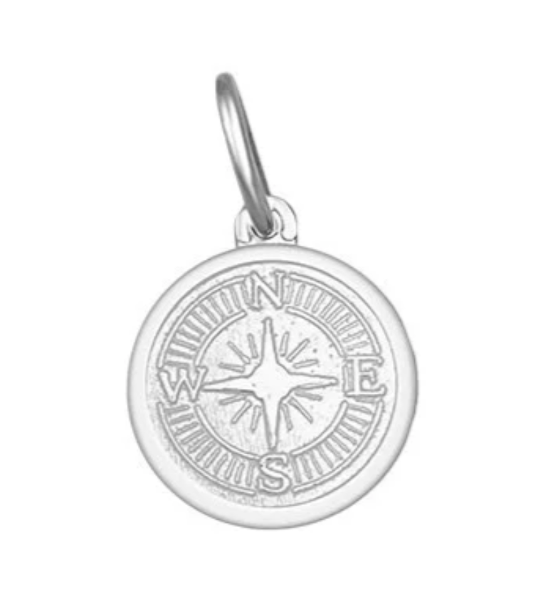 Silver compass pendant on a white background