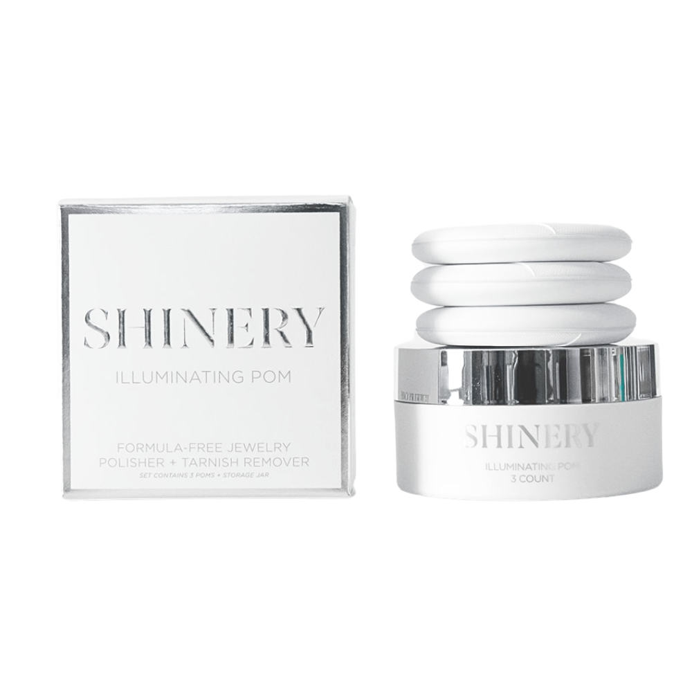 Shinery Illuminating Pom packaging with a jar on a white background. Available at Be Charmed