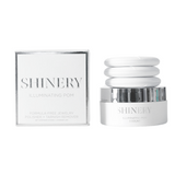 Shinery Illuminating Pom packaging with a jar on a white background. Available at Be Charmed