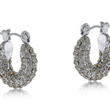 Silver Big Metal London Doris stone‑encrusted stainless steel stud earrings with shimmering crystal inlays, hypoallergenic surgical steel, ideal for sensitive ears. Available at Be Charmed