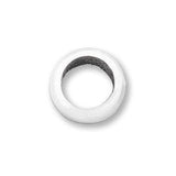 A single white, round, sterling silver pendant spacer with a center drilled hole. Available at Be Charmed