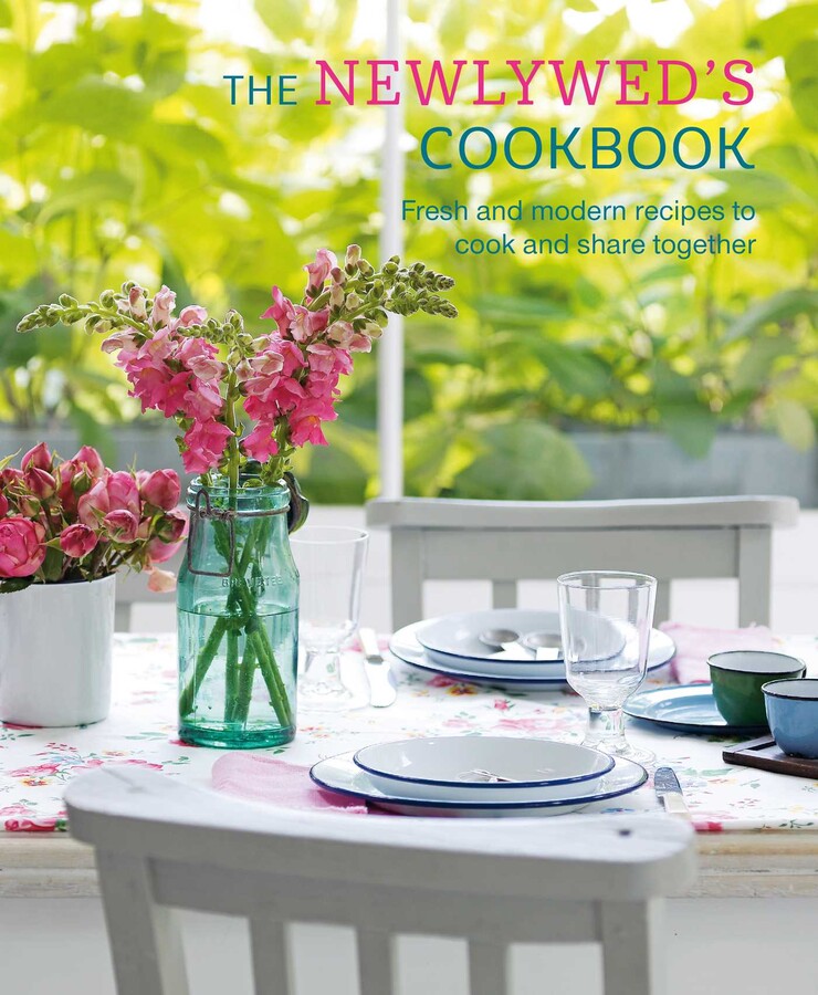 Cookbook cover titled 'The Newlywed's Cookbook' with a table setting and flowers. Available at Be Charmed