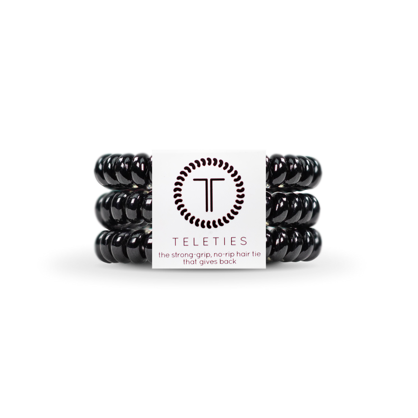 A pack of Small Teleties hair ties in Jet Black, presented in a white box with the Teleties logo. Available at Be Charmed