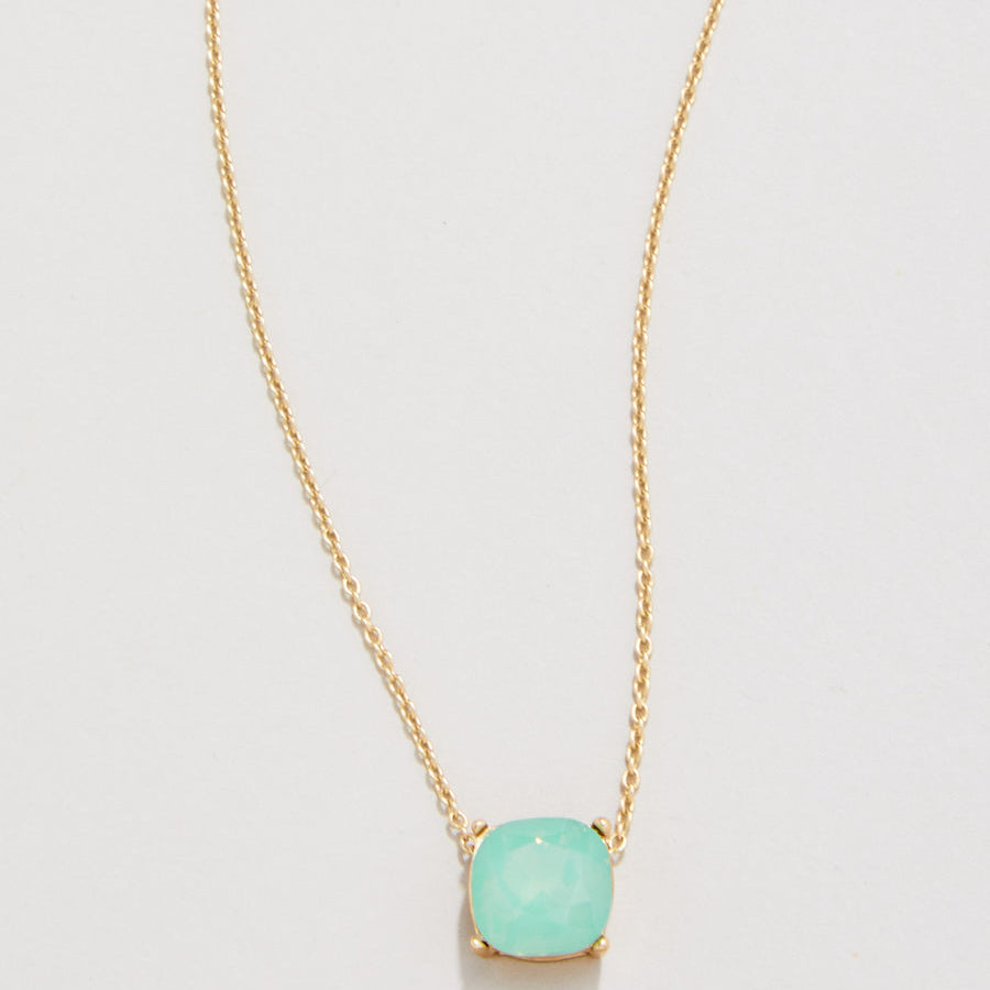 Spartina 449 Be Happy Gold Necklace 18 Inch – Sea Green charm necklace with “Be Happy” engraving. Features a dainty chain and uplifting design in soothing tones. A perfect everyday reminder of joy and positivity. Secure clasp closure. Available at Be Charmed.