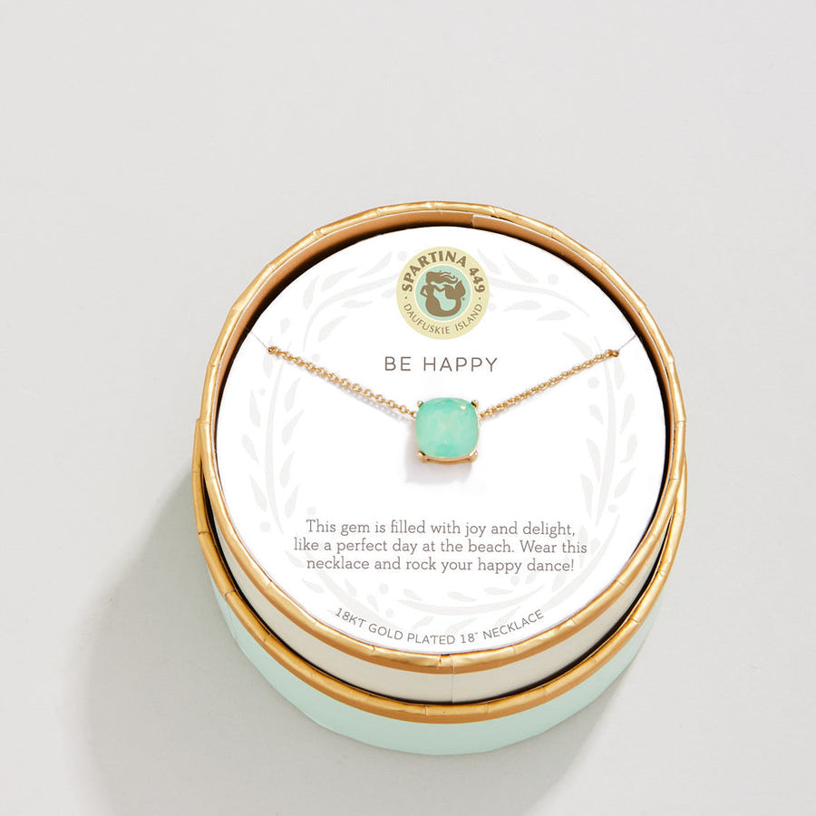 Spartina 449 Be Happy Necklace 18 Inch – Sea Green charm necklace in box, with “Be Happy” engraving. Features a dainty chain and uplifting design in soothing tones. A perfect everyday reminder of joy and positivity. Secure clasp closure. Available at Be Charmed.
