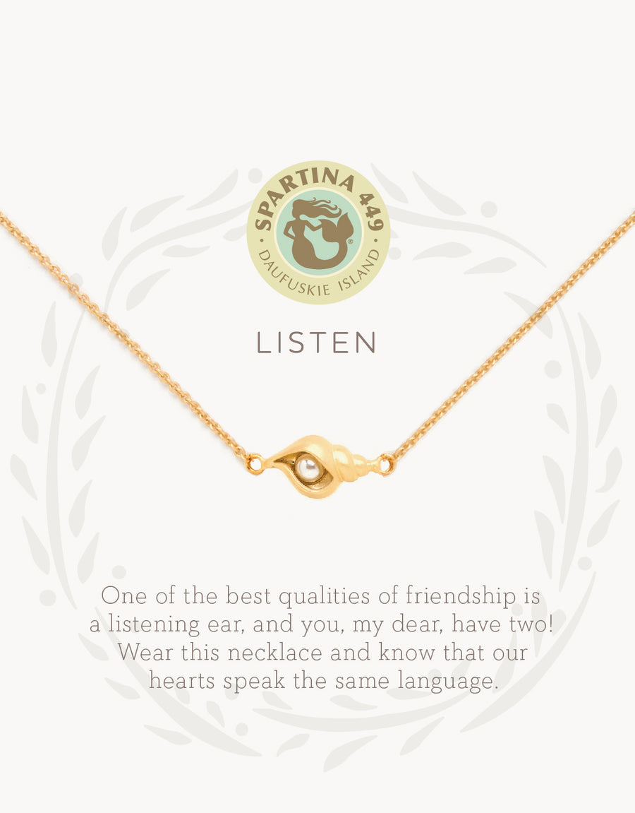 Gold on card Spartina 449 Listen Necklace 18 Inch – Shell charm necklace symbolizing mindfulness and inner peace. Features an engraved “Listen” message and delicate chain. Inspired by the calming sound of the sea. Lightweight, adjustable design with secure clasp.
