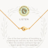 Gold on card Spartina 449 Listen Necklace 18 Inch – Shell charm necklace symbolizing mindfulness and inner peace. Features an engraved “Listen” message and delicate chain. Inspired by the calming sound of the sea. Lightweight, adjustable design with secure clasp.