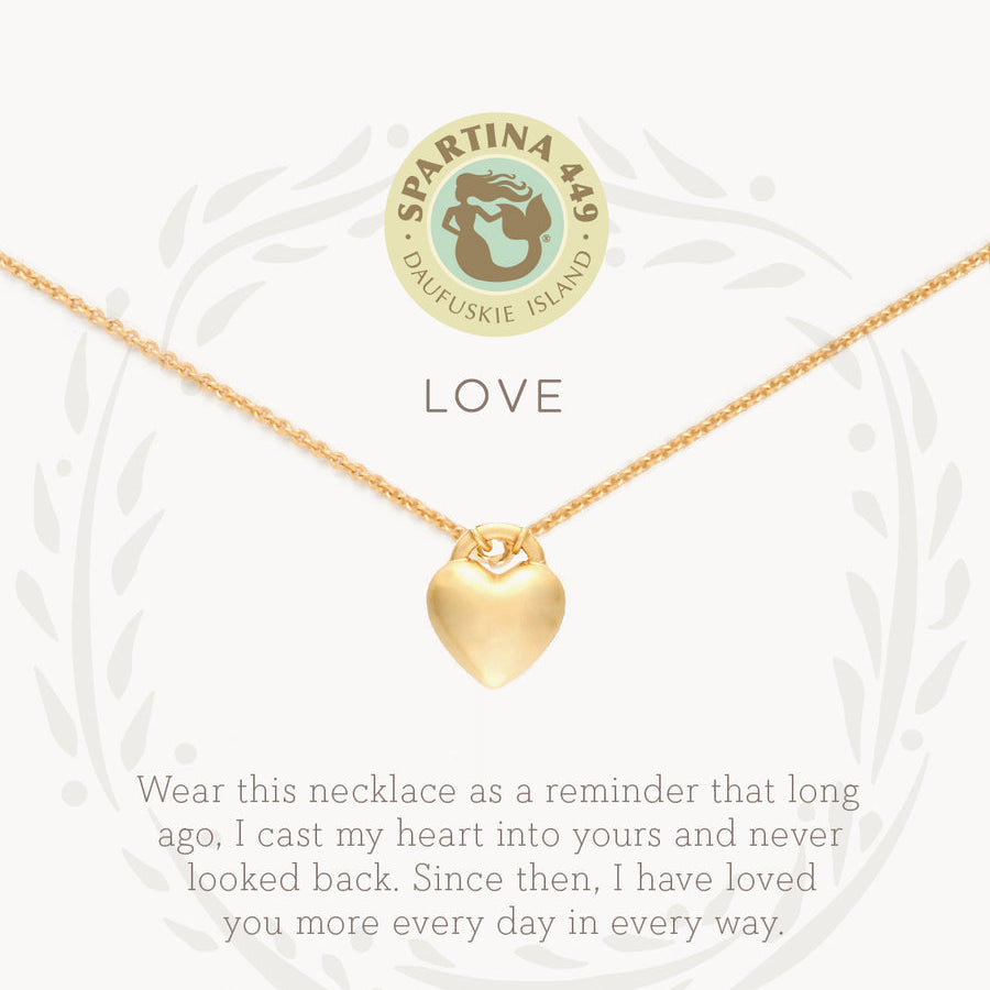 Gold on card Spartina 449 Love Necklace 18 Inch – Elegant heart charm necklace engraved with “Love.” A classic and meaningful gift for someone special. Features a delicate 18" chain, secure clasp, and polished finish, ideal for daily wear or special occasions. Available at Be Charmed.