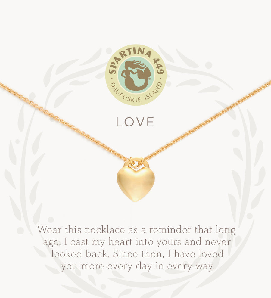Gold on card Spartina 449 Love Necklace 18 Inch – Elegant heart charm necklace engraved with “Love.” A classic and meaningful gift for someone special. Features a delicate 18" chain, secure clasp, and polished finish, ideal for daily wear or special occasions. Available at Be Charmed.