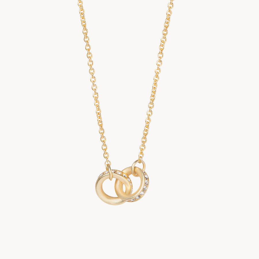 Gold Spartina 449 Unbreakable Necklace 18 Inch – Features two interlocking rings symbolizing enduring strength and connection. A delicate 18" chain with secure clasp supports this elegant and meaningful charm design. Perfect gift for loved ones. Available at Be Charmed.
