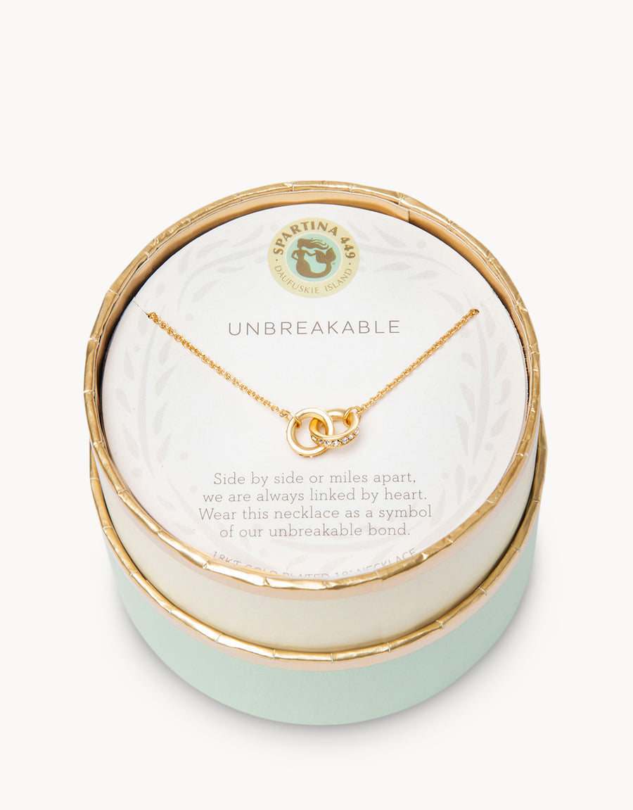 Gold in box Spartina 449 Unbreakable Necklace 18 Inch – Features two interlocking rings symbolizing enduring strength and connection. A delicate 18" chain with secure clasp supports this elegant and meaningful charm design. Perfect gift for loved ones. Available at Be Charmed.