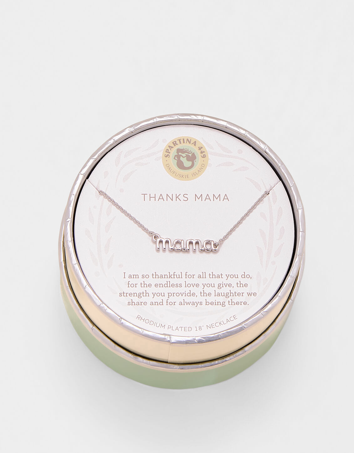 Necklace with 'THANKS MAMA' pendant in a round green box on a light gray background. Available at Be Charmed
