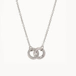 Silver Spartina 449 Unbreakable Necklace 18 Inch – Features two interlocking rings symbolizing enduring strength and connection. A delicate 18" chain with secure clasp supports this elegant and meaningful charm design. Perfect gift for loved ones. Available at Be Charmed.