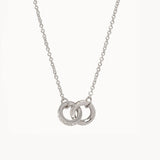 Silver Spartina 449 Unbreakable Necklace 18 Inch – Features two interlocking rings symbolizing enduring strength and connection. A delicate 18" chain with secure clasp supports this elegant and meaningful charm design. Perfect gift for loved ones. Available at Be Charmed.