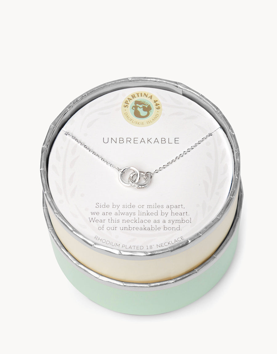 Silver in box Spartina 449 Unbreakable Necklace 18 Inch – Features two interlocking rings symbolizing enduring strength and connection. A delicate 18" chain with secure clasp supports this elegant and meaningful charm design. Perfect gift for loved ones. Available at Be Charmed.