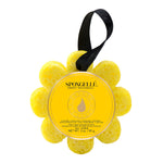 A yellow Spongellé bath sponge in the shape of a flower with a black hanging ribbon, packaging displays product information. Available at Be Charmed