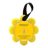 A yellow Spongellé bath sponge in the shape of a flower with a black hanging ribbon, packaging displays product information. Available at Be Charmed