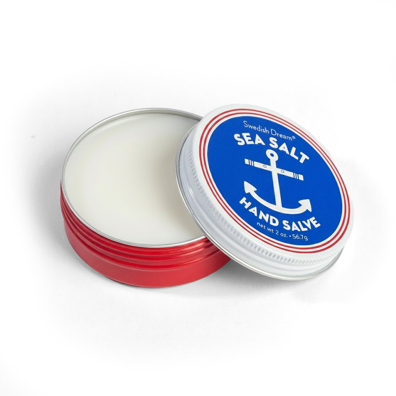 Sea Salt Hand Salve container with blue label and red accents on a white background. Available at Be Charmed