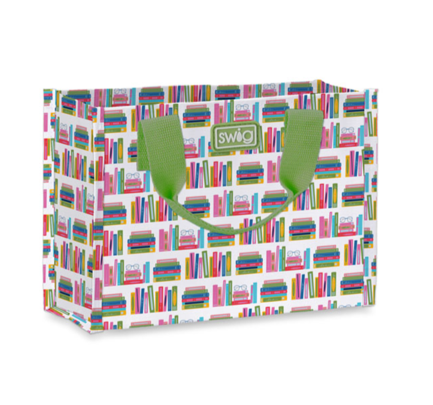 A small Book Club Swig Life reusable gift bag with webbed nylon handles and a vibrant patterned finish. Available at Be Charmed.