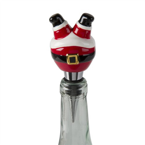 A festive sculpted ceramic Santa Claus wine and beverage bottle stopper, available at Be Charmed.