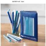 Menorah candles with a blue packaging box on a wooden surface. Availale at Be Charmed