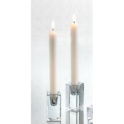 Two lit candles in clear glass candle holders on a white background. Available at Be Charmed