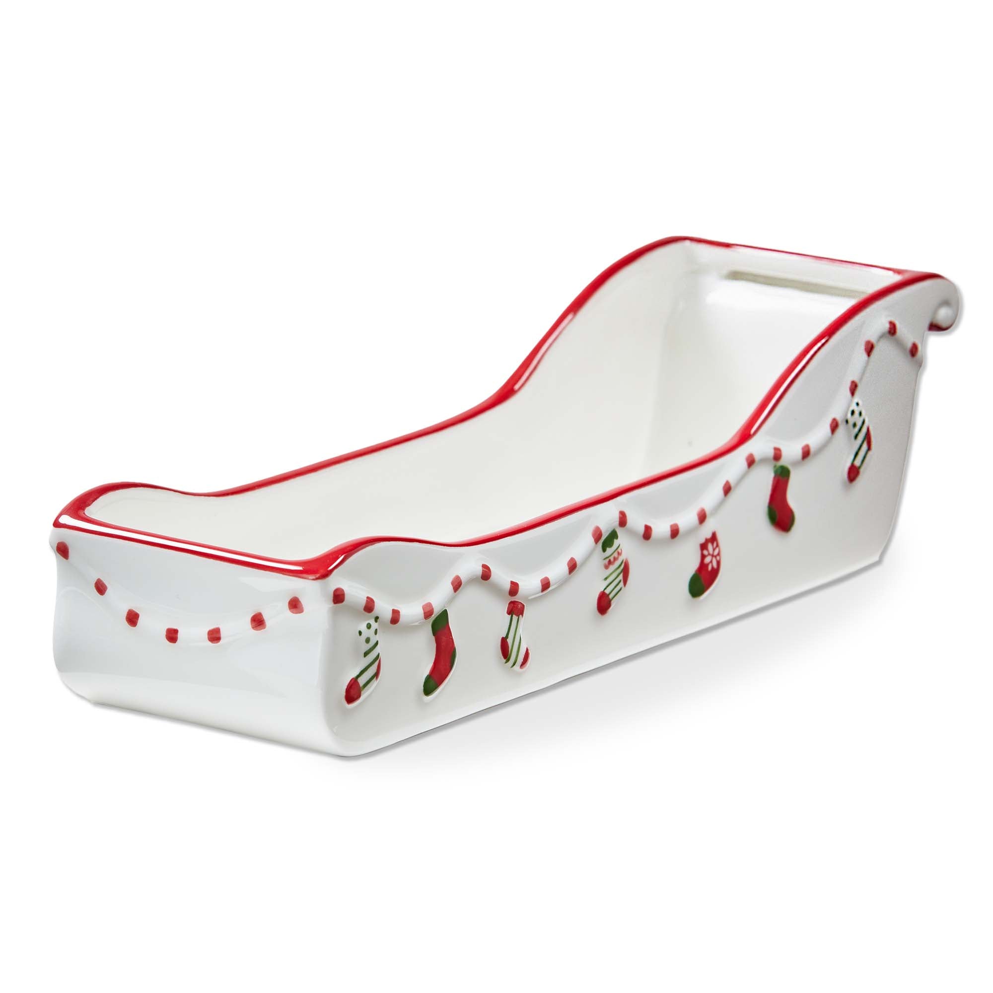A festive ceramic sleigh-shaped cracker dish from the Holiday Cheer collection, available at Be Charmed.