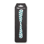 Spreader with holly design in packaging on a white background. Available at Be Charmed