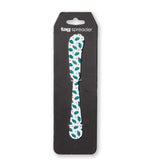 Spreader with holly design in packaging on a white background. Available at Be Charmed