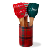 A festive Christmas holiday silicone baking spatula featuring a smooth beechwood handle and double-sided silkscreen graphics, available at Be Charmed.