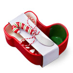 Red tocking shaped candy dish with green bowl, silver knifew ithcandy cane handle  on a white background. Available at Be Charmed