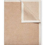 Tan Chappy Wrap Harborview Herringbone Blanket – Original size throw in a classic light grey herringbone pattern. Plush, durable, and machine washable. A cozy neutral accent for the home or perfect gift. Available at Be Charmed.