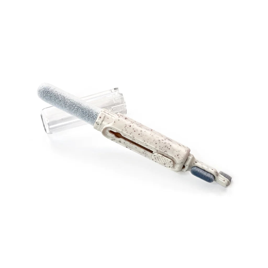Tech Candy Earbud Cleaner Tool – compact multi-use cleaner for removing dust, wax, and debris from earbuds. Available at Be Charmed