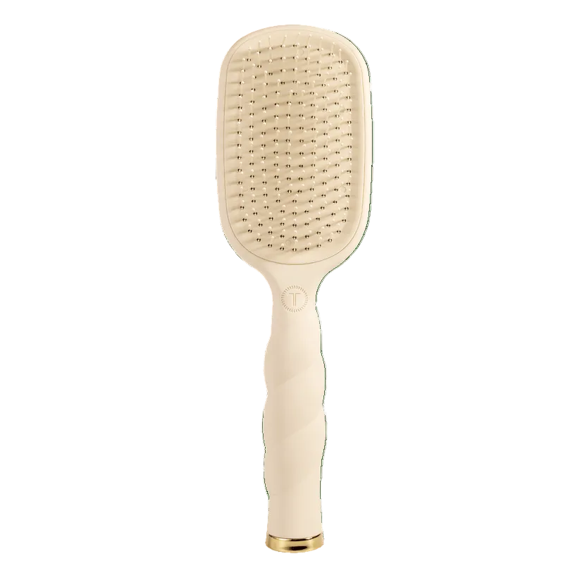 Tan Teleties Detangler paddle hairbrush for thick hair with gold accents on a transparent background. Available at Be Charmed