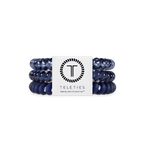 Set of Nightfall Navy hair ties with a Teleties branded label on a white background. Available at Be Charmed
