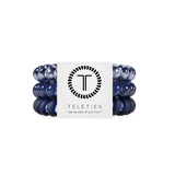 Set of large  Nightfall Navy hair ties with a Teleties branded label on a white background. Available at Be Charmed
