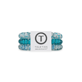 Set of Soft Surf hair ties with a Teleties branded card on a white background. Available at Be Charmed